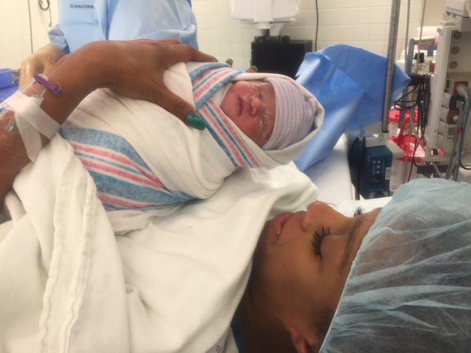 Kira Johnson after giving birth to her son, Langston Johnson.